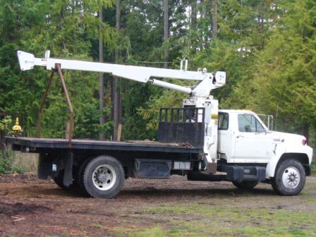 Boom truck
F-700 with 30' stick boom 2 stage, 14' dump flat bed
