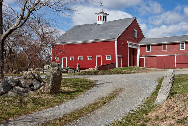 &lt;p&gt;It had just stopped raining &amp; snowing (!) when the clouds opened up to blue sky.&nbsp; The red barn&nbsp;with cupola on top give you that great New England 'look'.&lt;/p&gt;
Keywords: Essex Massachusetts MA Red Barn New England Cupola spring red history sky clouds