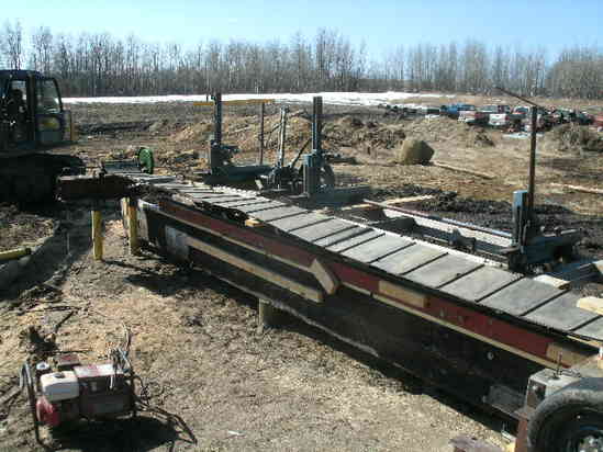The conveyor system
old swather canvass split down the middle

